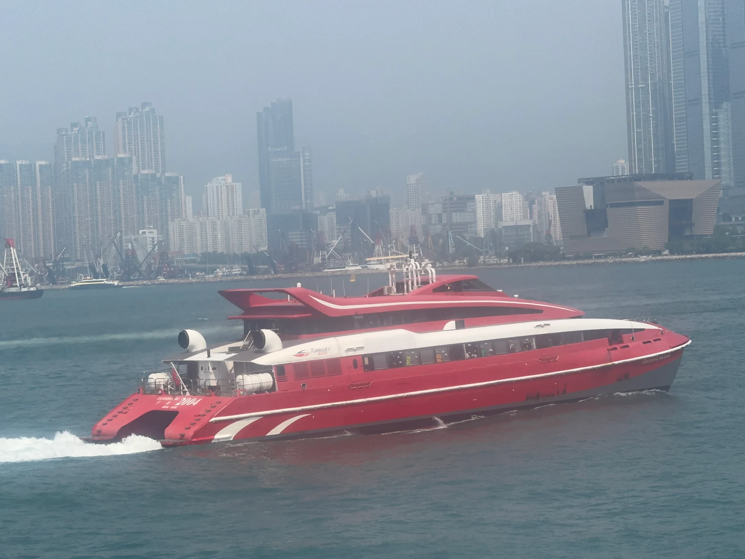 Red TurboJET high-speed ferry underway in October 2026